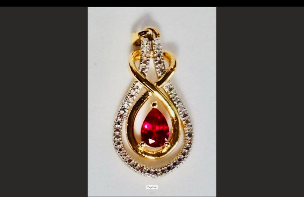Prime Art & Jewels BR Gold Over Brass Diamond & Ruby CZ  Figure 8 Pendant 1.25"